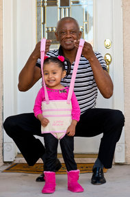 Jeffrey Nash, shown with Donna Sanchez, invented the Juppy, a sling that helps children learn to walk.